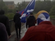 Skotsk aktivist tiltalt for hatkriminalitet på grunn av banner