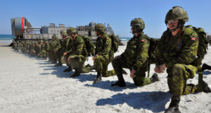 https://commons.wikimedia.org/wiki/File:US_Navy_090424-G-6464J-013_Canadian_soldiers_set_a_perimeter_position_after_disembarking_a_U.S._Navy_landing_craft_during_a_simulated_amphibious_landing.jpg